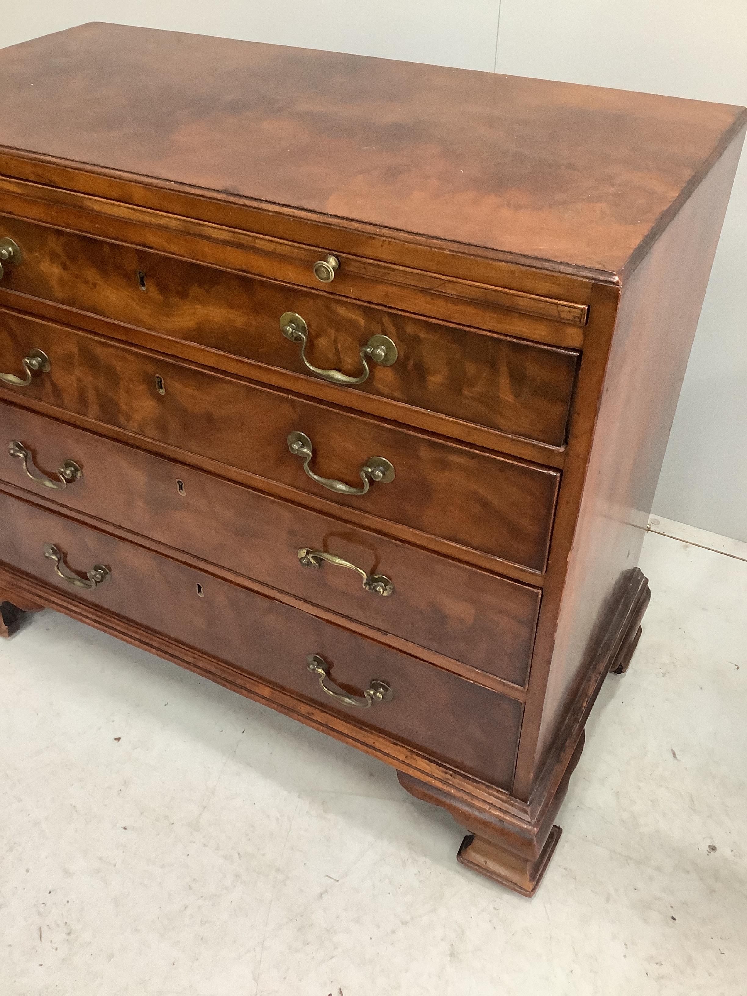 A George III mahogany four drawer chest with brushing slide, width 91cm, depth 46cm, height 80cm